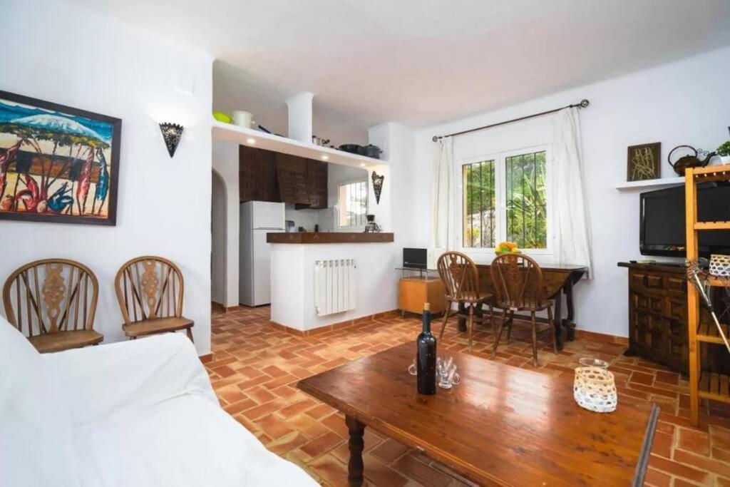4 persoons bungalow met gemeenschappelijk zwembad Teulada Buitenkant foto